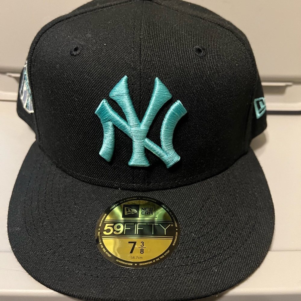 New Era Black Cap with Teal Logo